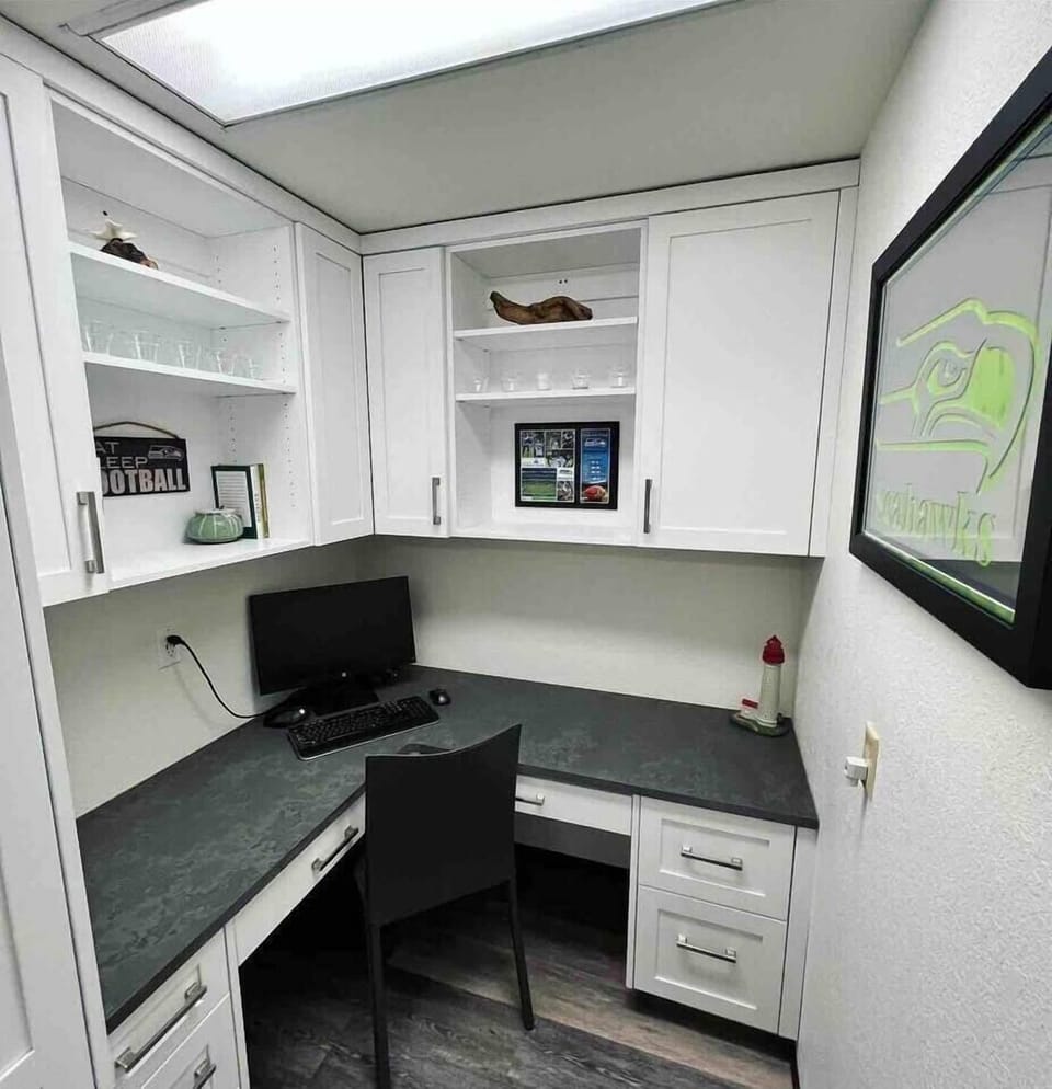 Office working space with 24-in monitor, wireless keyboard + mouse