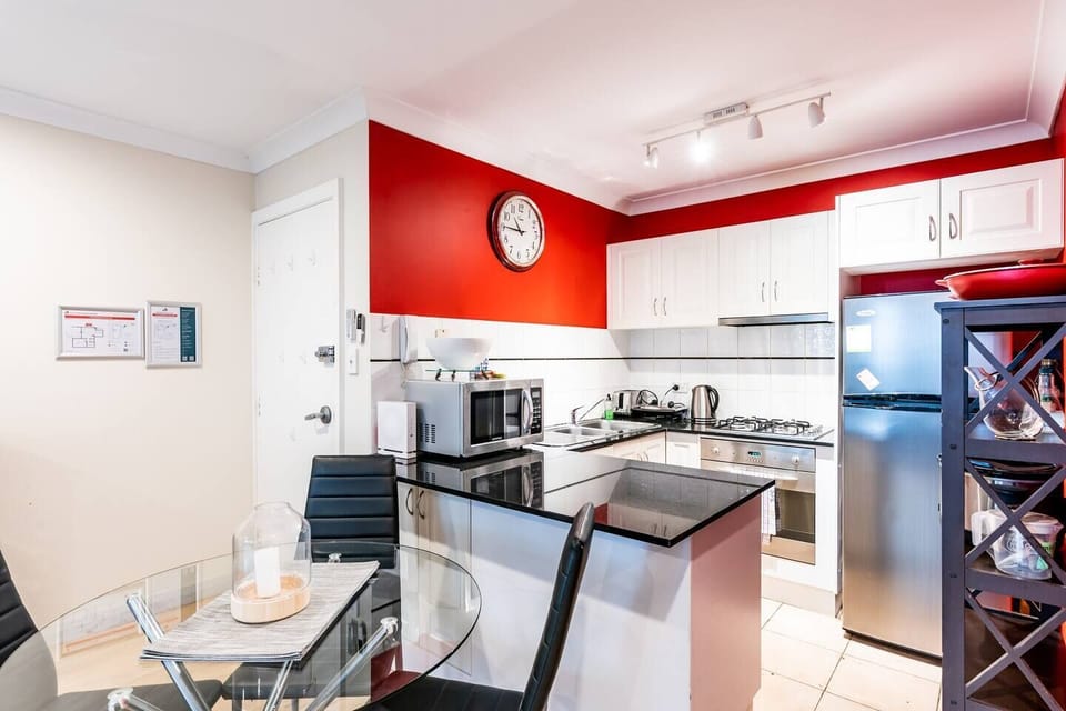 The kitchen is fully equipped with everything you need to prepare meals at home - a fridge, oven, stove, microwave, kettle and toaster.