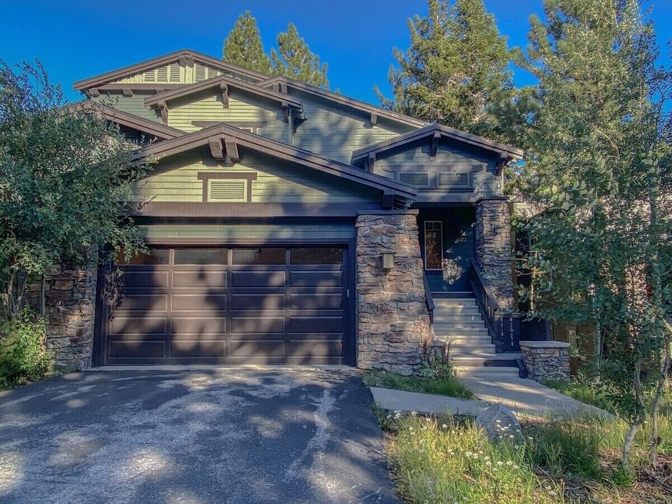 The front of our home, showing our 2 car garage and private driveway.