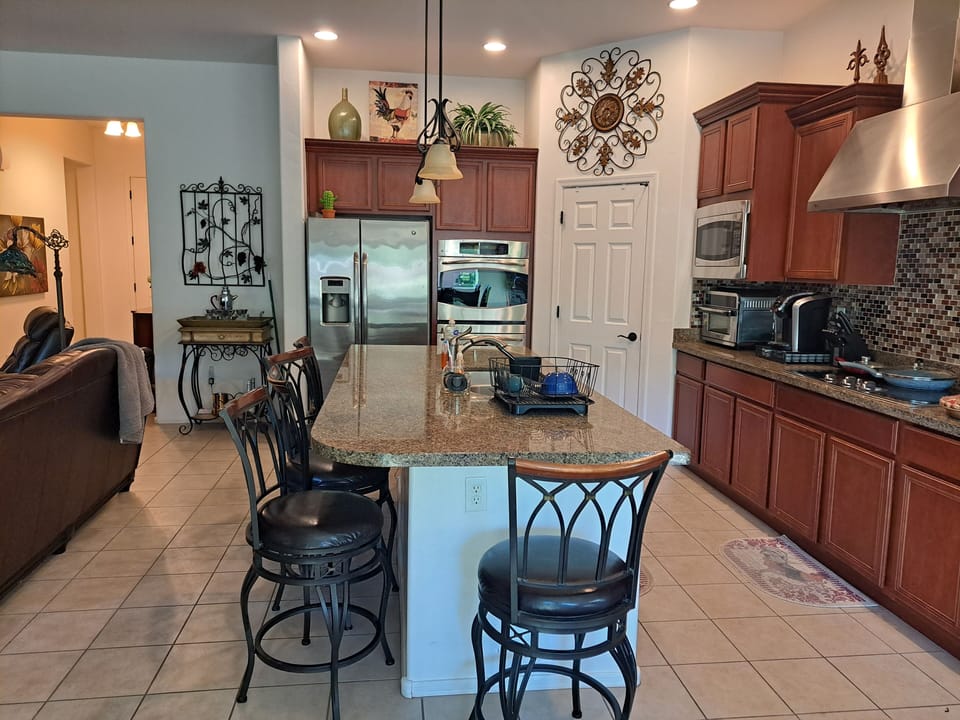 Chef's Kitchen fully stocked including air fryer, Keurig, double oven, gas stove