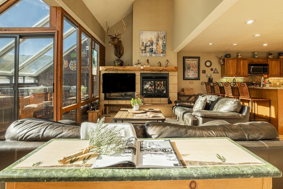 Main Level Living Room with Gas Fireplace, 50" Smart TV