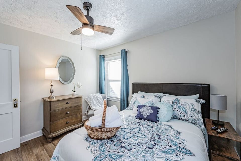 Also located on the first floor, this cozy bedroom offers a queen bed, flat-screen Roku TV, and a ceiling fan—the perfect space for a restful night’s sleep!