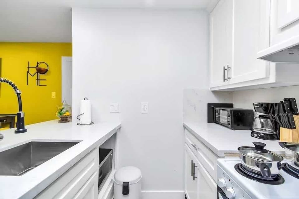 Kitchen with basic amenities and counter top applicances