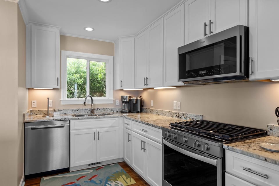 Your fully equipped kitchen features granite countertops, stainless steel appliances, and everything you need to create memorable meals during your stay.