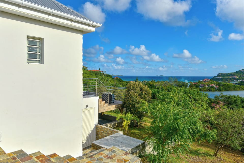 Beautiful garden surrounding the property. Private parking at the entrance. 