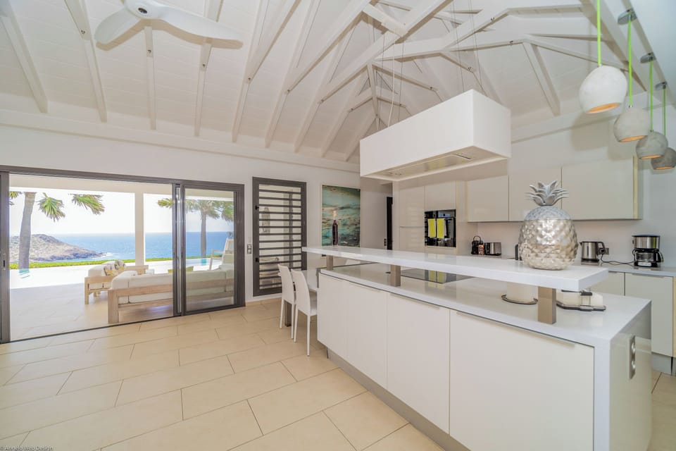 Fully equipped with gas oven and stove, microwave, fridge and freezer, ice maker, wine cellar, Nespresso machine, toaster, dishwasher, ceiling fan, electric kettle, Sonos sound system. Outdoor gas barbecue. Outdoor dining table on the covered terrace. 