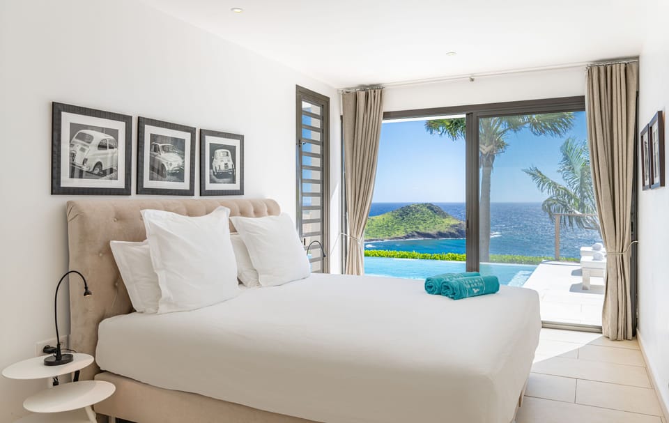 King size bed, air conditioning, safe. Bathroom shared with Bedroom 3, with Italian shower, bathrobes, bath and beach towels and hair dryer.