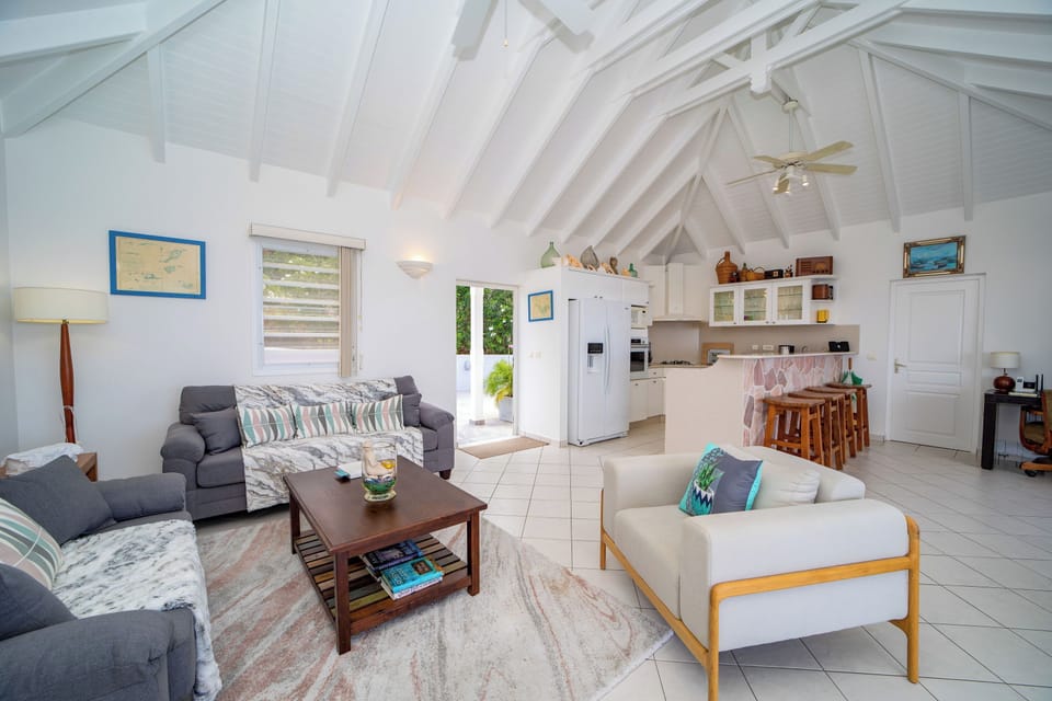 Spacious air-conditioned living room. Ceiling fan, HD-TV, Dish Network. 