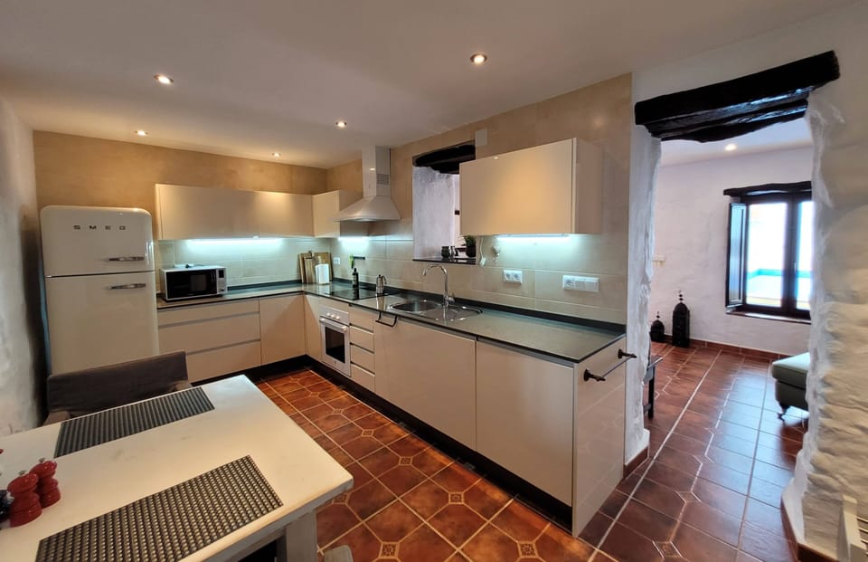 Kicthen & diner with smeg fridge, washing machine, dishwasher and induction hob