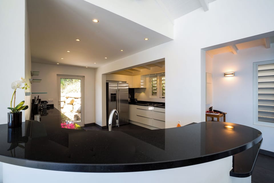 Fully equipped kitchen. Electric oven, gas stove, microwave, refrigerator, mixer, centrifuge, freezer, dishwasher, Nespresso machine, blender, kettle, toaster, breakfast bar. Indoor dining table in the great room. Outdoor Large dining table for 8 guests. 