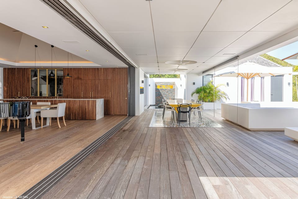 Outdoor dining table for 14 guests on the covered terrace. 