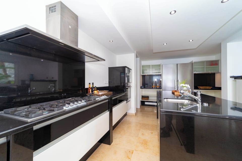 Fully equipped kitchen with electric oven, gas stove, convection oven, microwave, hood, refrigerator, freezer with ice makers, dishwasher, wine cellar, blender, Nespresso coffee maker, toaster. Gas barbecue outside. Dining area with a table for 8 people, 