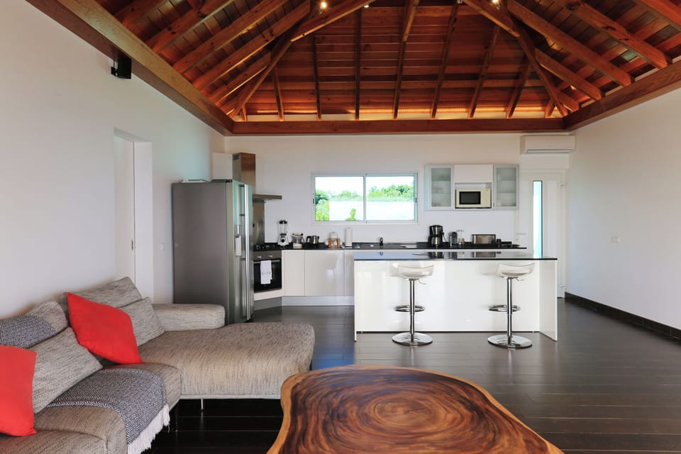 Air conditioning, ceiling fan, HD-TV, Dish network, DVD player. Opens onto the terrace. 