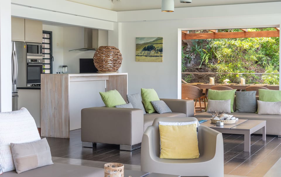Beautiful open floor lounge areas, opening directly onto the terrace and the views. 