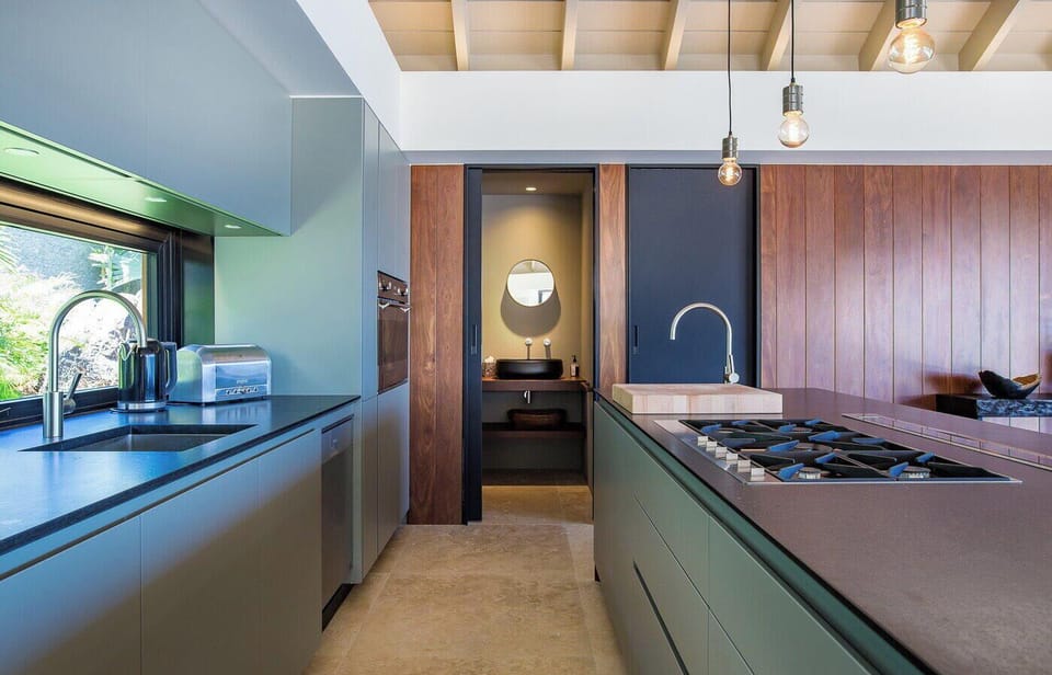 Fully equipped gourmet air-conditioned kitchen with electric oven, gas stove, convection oven, microwave, hood, two refrigerators/freezers with ice makers, dishwasher, blender, Nespresso coffee maker, toaster, bar counter. Gas barbecue and plancha outside