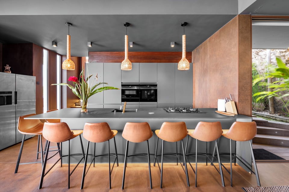 Fully equipped kitchen, central island unit, fridge and freezer with ice machine, cooking range with gas burners, hood, microwave, dishwasher, filter coffee maker and espresso coffee machine, wine cooler, toaster. Outdoor wooden dining table on the covere