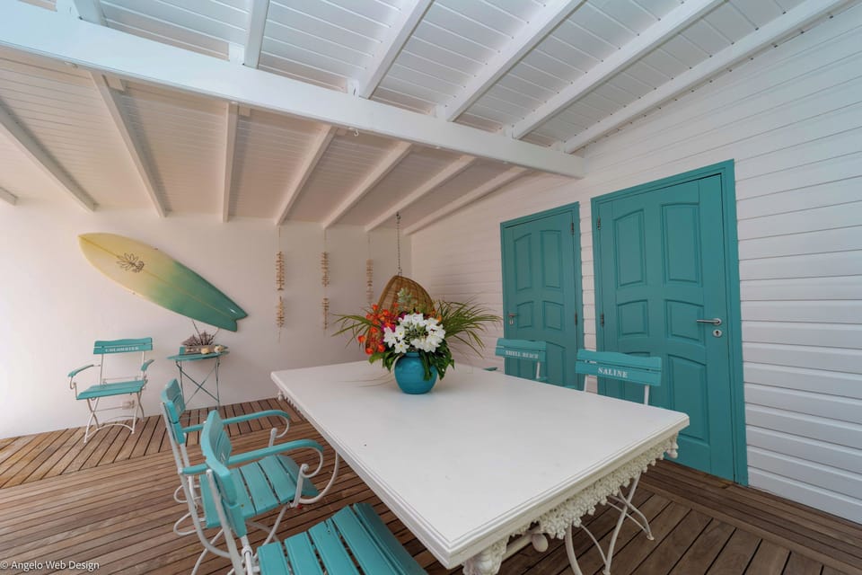Fully equipped kitchen with breakfast bar for 4, electric oven, gas stove, microwave, dishwasher, regular coffee machine, fridge and freezer, toaster, electric kettle. Charcoal BBQ on the terrace. Indoor dining area, and dining table for 6 people on the c
