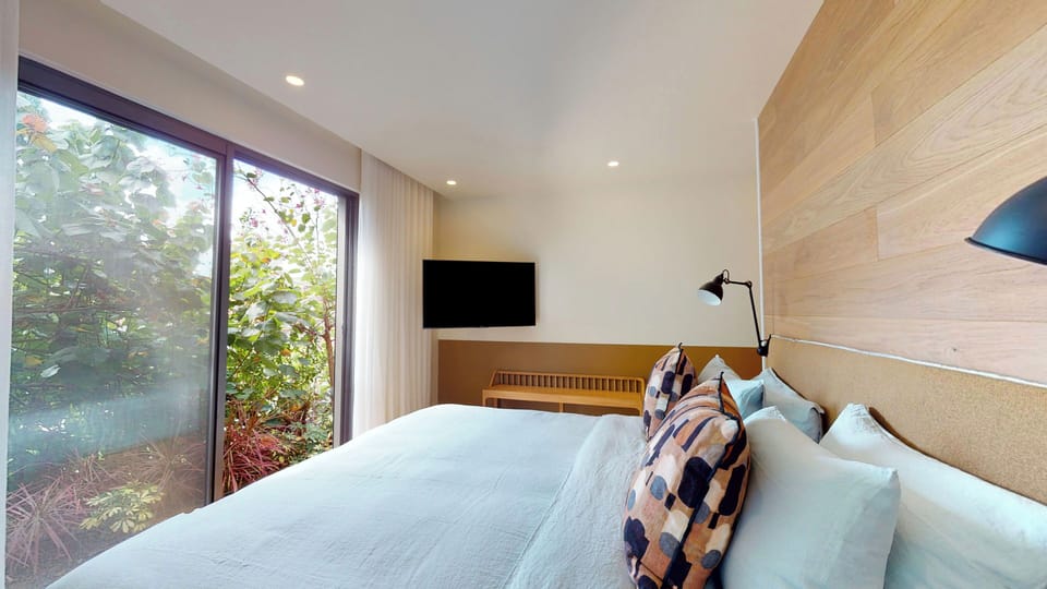 On the lower level. King size bed, air conditioning, HD-TV, Dish Network, Apple TV, safe, dressing room. Adjoining bathroom, Italian shower, hairdryer.  