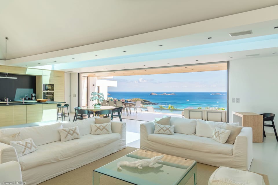 Air conditioning, ceiling fan, HD-TV, Dish network, DVD player, Apple TV. Opens onto the terrace. Outdoor lounge area on the covered terrace with HD-TV. Ocean view. 