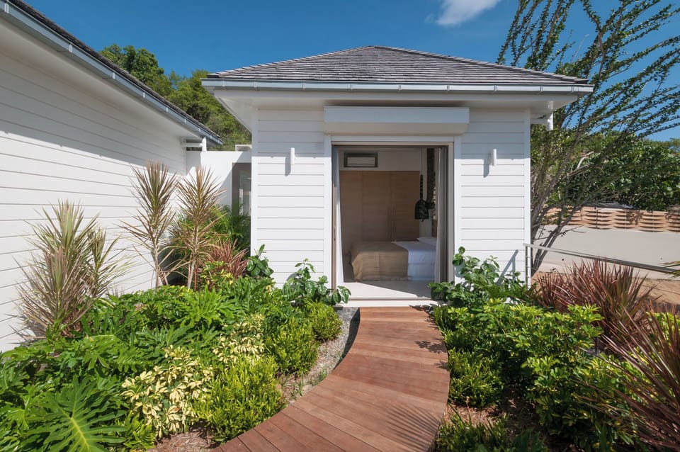 King size bed, air conditioning. Adjoining bathroom with shower, sink, hair dryer, towels and beach towels. 
