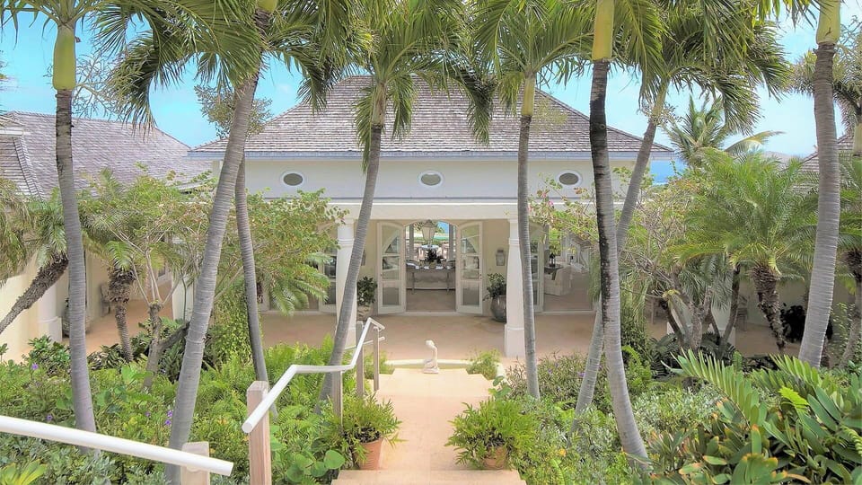 A lush tropical garden surrounds the villa with gaiacs, cactus & tropical plantings. Private parking at the entrance of the property. 