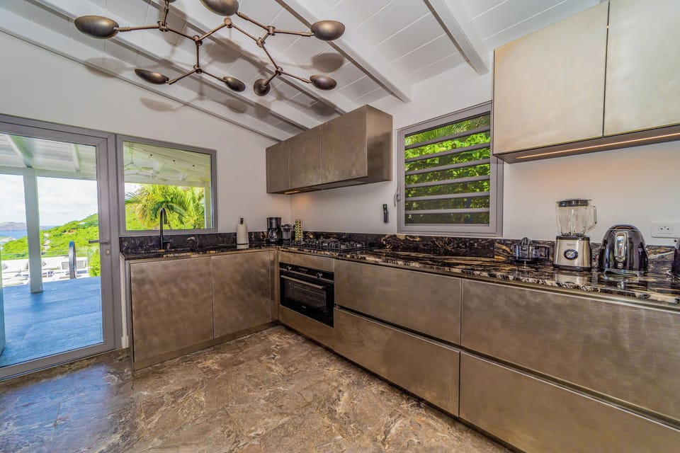 Fully equipped with bar, electric oven, gas stove, dishwasher, fridge and freezer, ice machine, microwave, toaster, filter coffee maker, and espresso coffee machine, blender, electric fruit press. Inside dining area and outdoor dining table on the terrace