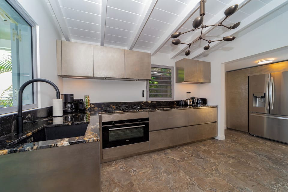 Fully equipped with bar, electric oven, gas stove, dishwasher, fridge and freezer, ice machine, microwave, toaster, filter coffee maker, and espresso coffee machine, blender, electric fruit press. Inside dining area and outdoor dining table on the terrace