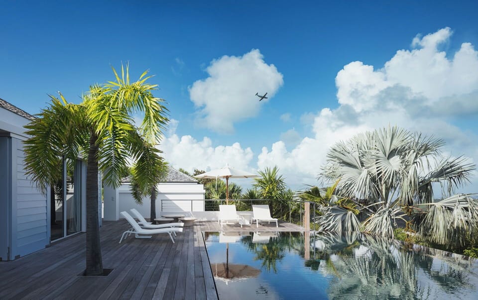 Beautiful 20m long heated pool, outdoor lounge areas, sun loungers. 