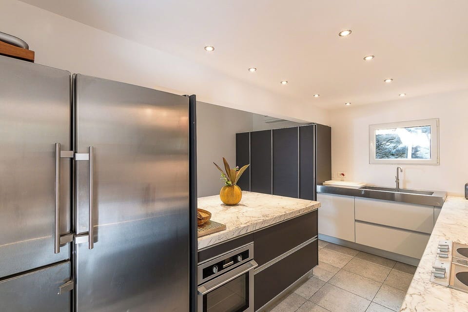 Fully equipped with bar, electric oven, gas stove, dishwasher, fridge and freezer, ice machine, microwave, toaster, filter coffee maker, and espresso coffee machine, blender, electric fruit press. Inside dining table in the great room. Outside dining tabl