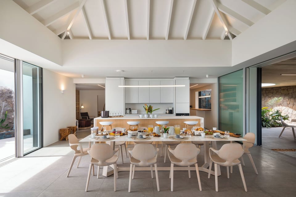 State of the art kitchen. Refrigerator, freezer, ice machine, dishwasher, oven, microwave, Nespresso machine, toaster, mixer, wine cellar.Back kitchen for private chef. Bar with stools. Professional Pizza oven. Indoor and outdoor dining areas for 10 guest