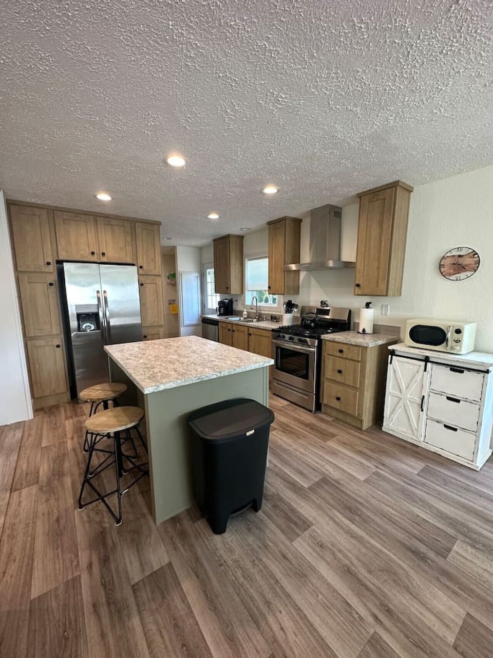 Gourmet Kitchen: Modern appliances and a stylish island make cooking a delight!
