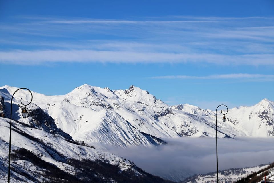 Alpine peaks frame the resort on all sides, a dramatic backdrop whether you're on skis or on foot.