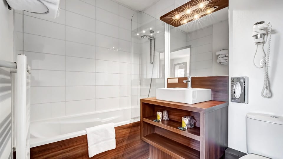 Prepare for your day in one of our bright bathrooms.