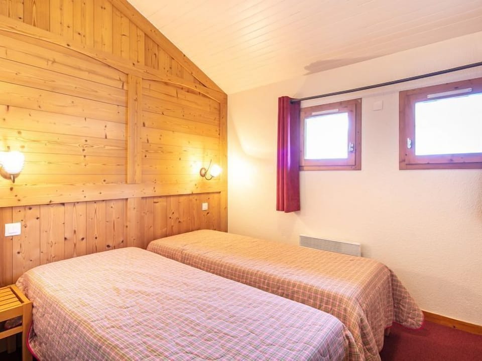 Get a good night's rest in the cozy bedroom.