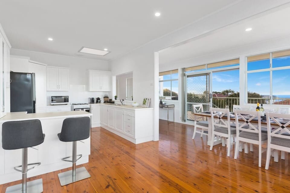 Enjoy slow mornings up at the breakfast bar or come together for a meal at the spacious dining table.
