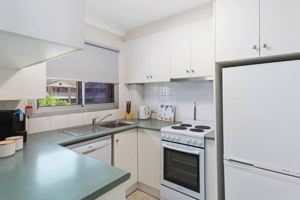 The fully equipped kitchen has everything that’s needed to cook meals at home, plus a dishwasher for easy clean-up. 