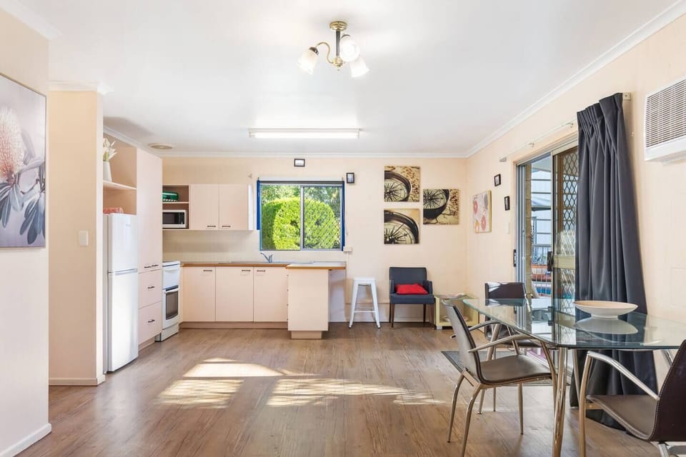   An indoor dining table makes it easy for guests to come together for a meal at home.