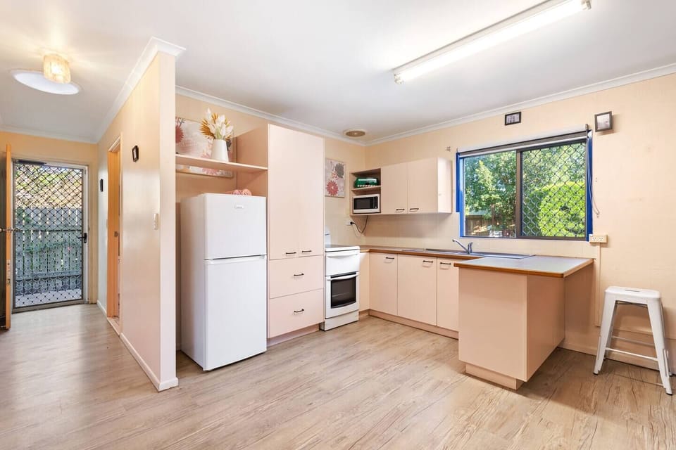 The kitchen is well equipped for meals at home with a fridge, oven, stove and microwave.
