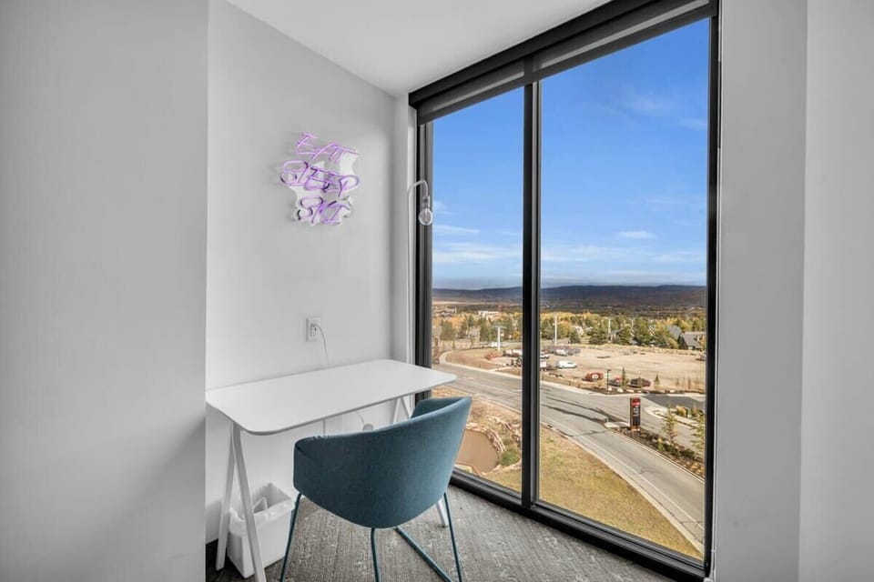 A stay in this home is perfect for those needing to keep up with remote work with three dedicated work pods and additional shared work spaces located in the building.