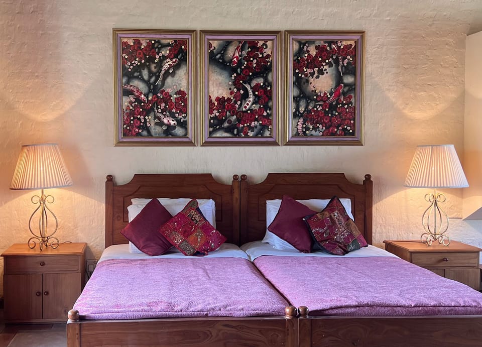 Original art in the upstairs bedroom