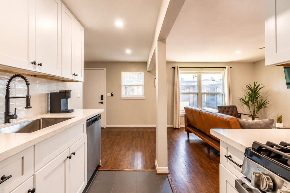 Bright and open kitchen with a cozy dining nook—great for meals at home.Bright and open kitchen with a cozy dining nook—great for meals at home.