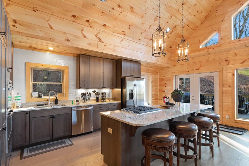 Gourmet Kitchen has Stainless Appliances, Gas Stove, and Granite Counters