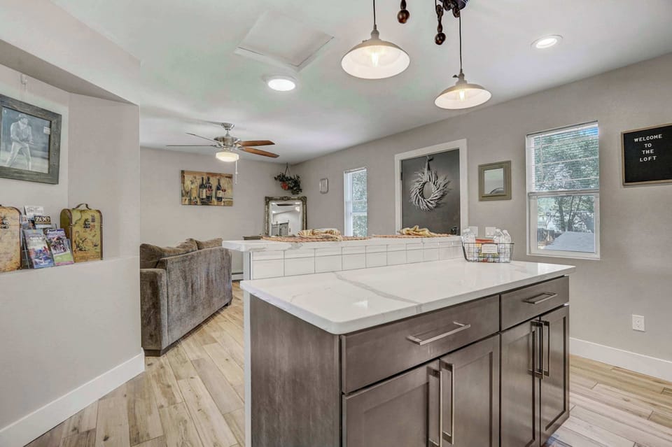 Cook and connect in this open-concept kitchen with a spacious island perfect for meal prep and gatherings.