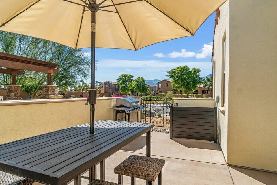 Shaded outdoor dining table to enjoy some fresh air.