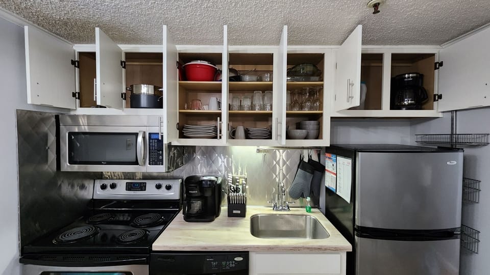 Fully Stocked kitchen.