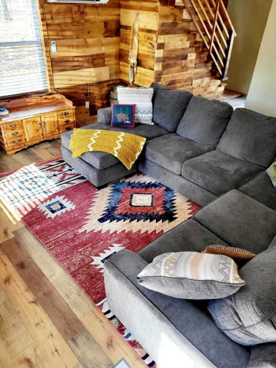 living room with 50" TV, fireplace