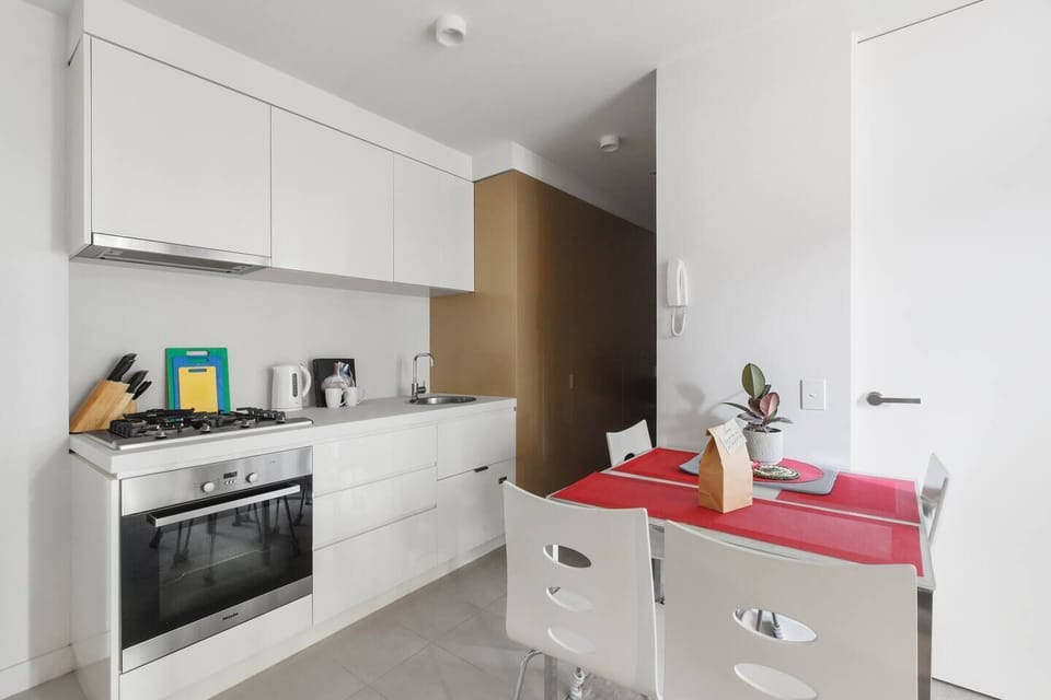 Cook up a storm in the modern kitchen fitted out with all the essentials and dine at home at the four-person table