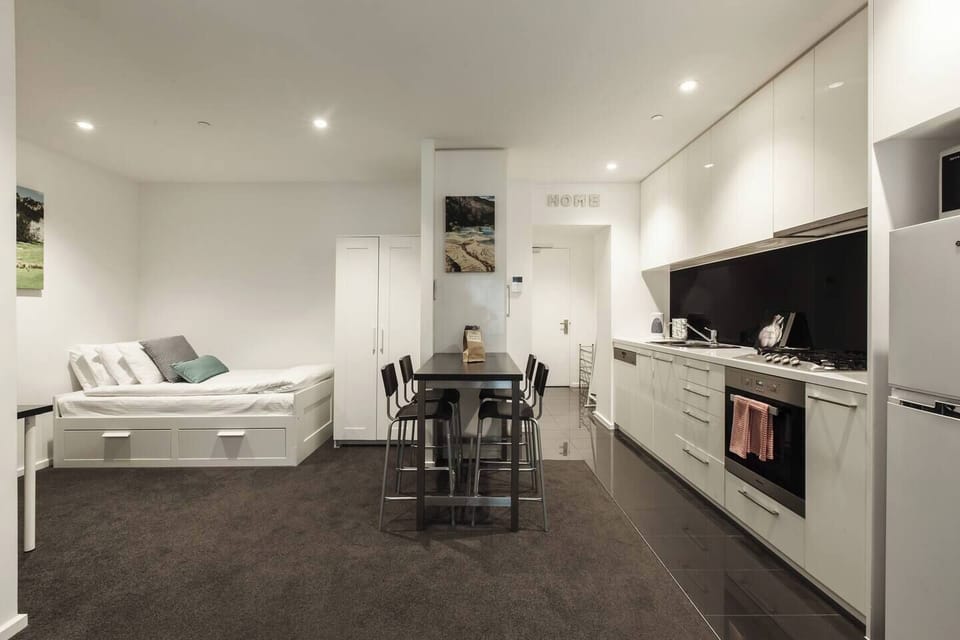 The open floor plan allows for maximum entertaining space with bar stool table for dining and drinking