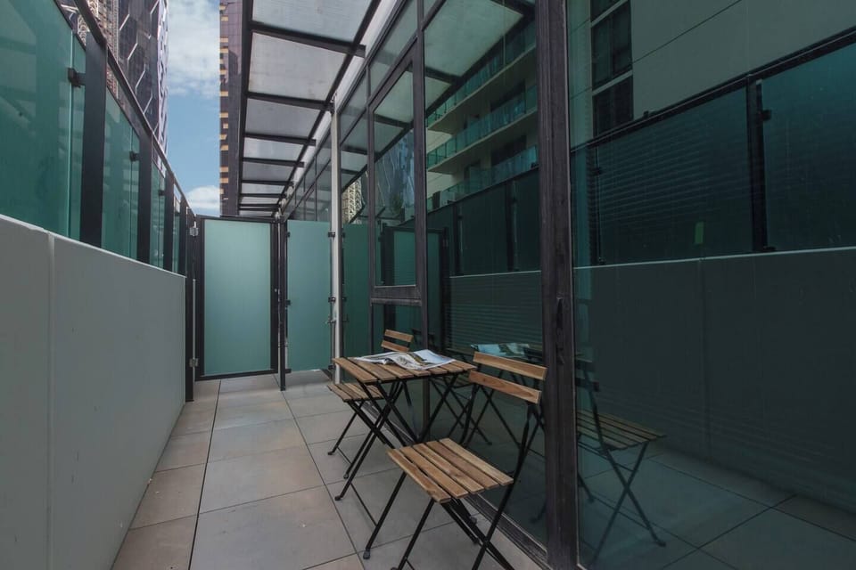 Step out of the sliding glass doors and onto a furnished balcony where you can enjoy your morning coffee with a side of fresh air