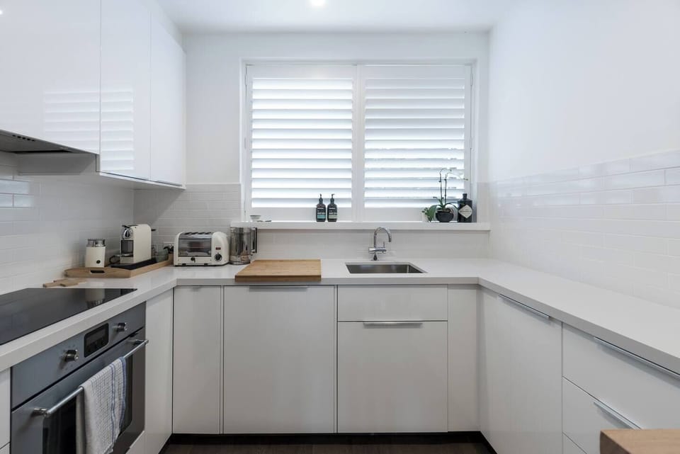 The kitchen is equipped for all your cooking needs, and fitted with a fridge, stove, oven, microwave, kettle and toaster.